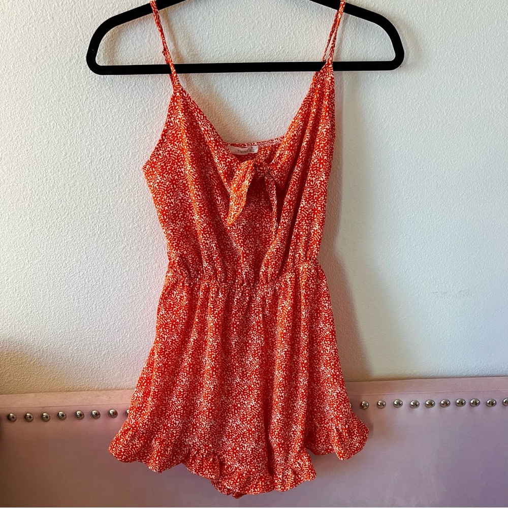 BRAND NEW Orange/White Floral Romper (S)